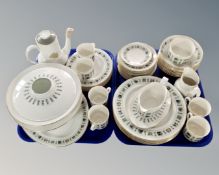 Two trays holding approximately 49 pieces of Royal Doulton tapestry tea and dinner china.