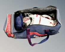 A Gunn and Moore holdall containing cricket equipment.