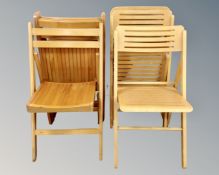 A set of four beech folding chairs and a further three chairs (7)