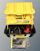 A Stanley toolbox containing assorted hand tools.