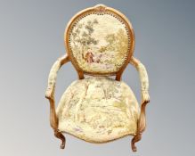 A continental carved beech framed salon armchair