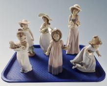 A tray of six Nao figures of girls.