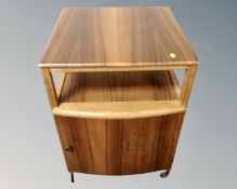 A rosewood effect mid century record cabinet.