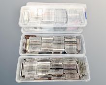 Four boxes of assorted CDs.