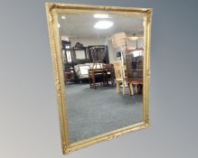 A Victorian style gilt over mantel mirror, 106cm by 136cm.