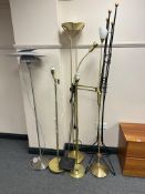 Six continental standard lamps and a metal adjustable hat and coat stand