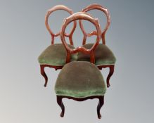 A set of three 19th century dining chairs on cabriole legs