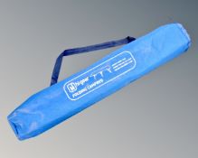 A Higear folding camp bed.