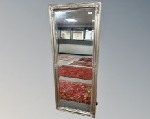 A contemporary silvered frame rectangular mirror.