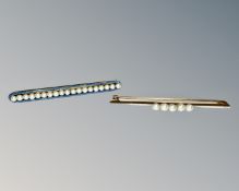An 18ct yellow gold and platinum pearl set bar brooch, width 45 mm,