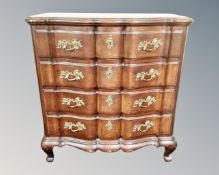 A 19th century mahogany serpentine front four drawer chest.