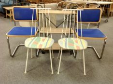 A pair of office chairs,