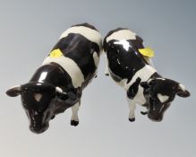 A Beswick bull Ch. Coddington Hilt Bar together with a cow Ch. Claybury Leegwater.