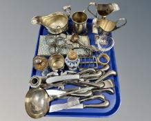 A collection of antique and later metal wares, silver topped castor, antique cream jugs,