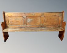 A late Victorian pitch pine pew.