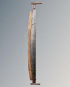 An antique two man saw.