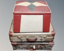 Two vintage luggage cases and a storage footstool.