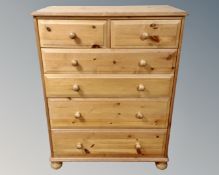 A pine chest of six drawers.