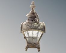 A brass hanging lamp.