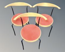 A set of three Danish Magnus Olesen elbow chairs.