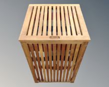 A teak laundry box,