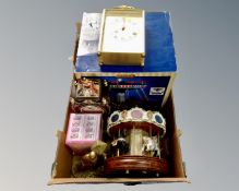 A box containing Lemax carousel, cast brass figure of a man leaning against a lamp post,