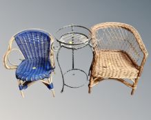 Two wicker child's chairs together with a wrought metal plant stand.