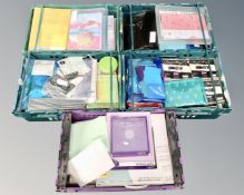 Five crates containing a large quantity of craft supplies.