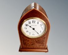 An 8 day arch-topped mantel clock, signed Cottell, Swindon.