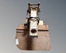 A Minirad circular saw together with a router table.