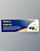 A boxed Vitrex tiling kit.
