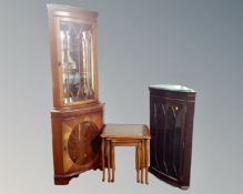 A yew wood glazed corner display cabinet fitted with cupboard beneath together with a matching nest