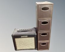 A Kustom KGA10FX guitar amplifier with lead, together with a CD chest.