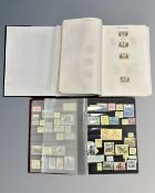 Two Avon stamp albums containing a total of 124 First Day Covers.