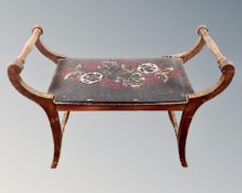 A 19th century piano stool.