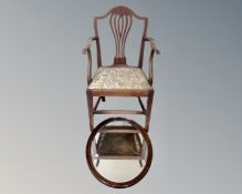 A group of furniture comprising a nest of three oak tables, a rush seated chairs, an oak mirror,