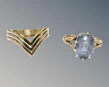 A 9ct three-tone gold ring, together with an antique yellow metal ring set with synthetic sapphire,