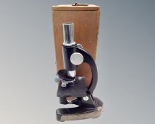 A Philo microscope in box.