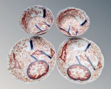 Two 19th century Japanese Imari porcelain tea bowls with saucers.