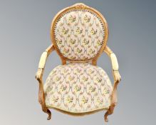 A continental carved beech framed salon armchair