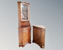 A reproduction standing corner cabinet together with a low corner cabinet.