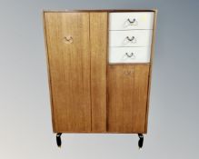 A G-Plan E. Gomme mini combination wardrobe.