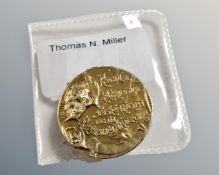 An antique commemorative Spanish coin converted to a brooch dated 1896.