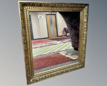 An ornate gilt framed mirror,