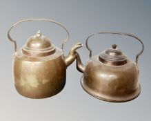 Two vintage copper kettles.