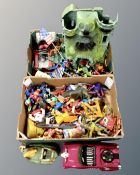 Two boxes containing vintage toys including He-Man Castle Greyskull and a large quantity of action