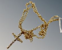 A 9ct gold crucifix on 9ct 18.5