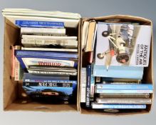 Two boxes of books relating to aviation.
