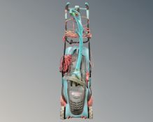A Bosch Rotak 40/17 Ergo electric lawn mower with grass box and lead and a Bosch strimmer