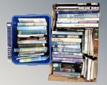 Two boxes of books relating to naval subjects.